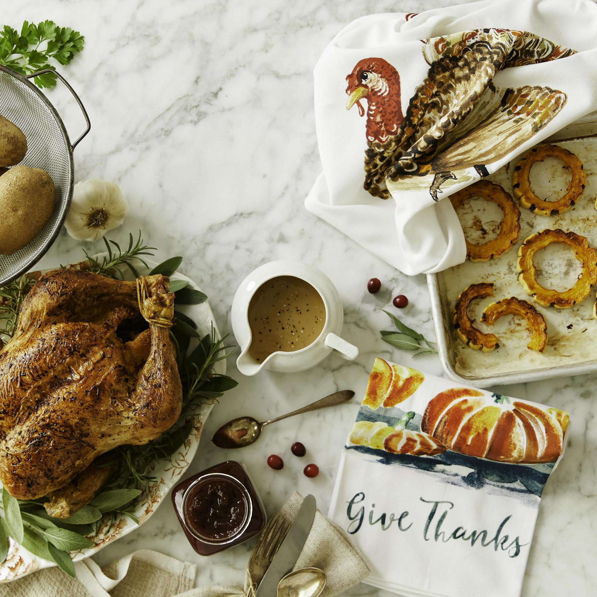 Thanksgiving meal featuring turkey, cranberry jelly